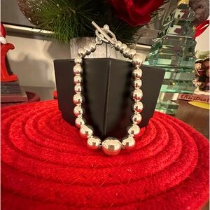 Tif Ball bracelet. 7inches .